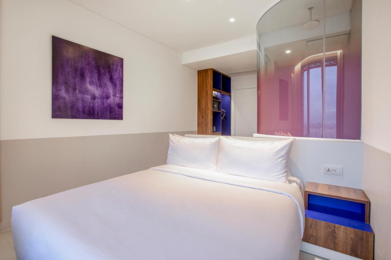 Wink Icon Hotel Danang Riverside - Luxury Suites - 24Hrs Stay & Rooftop Pool Bar Buitenkant foto