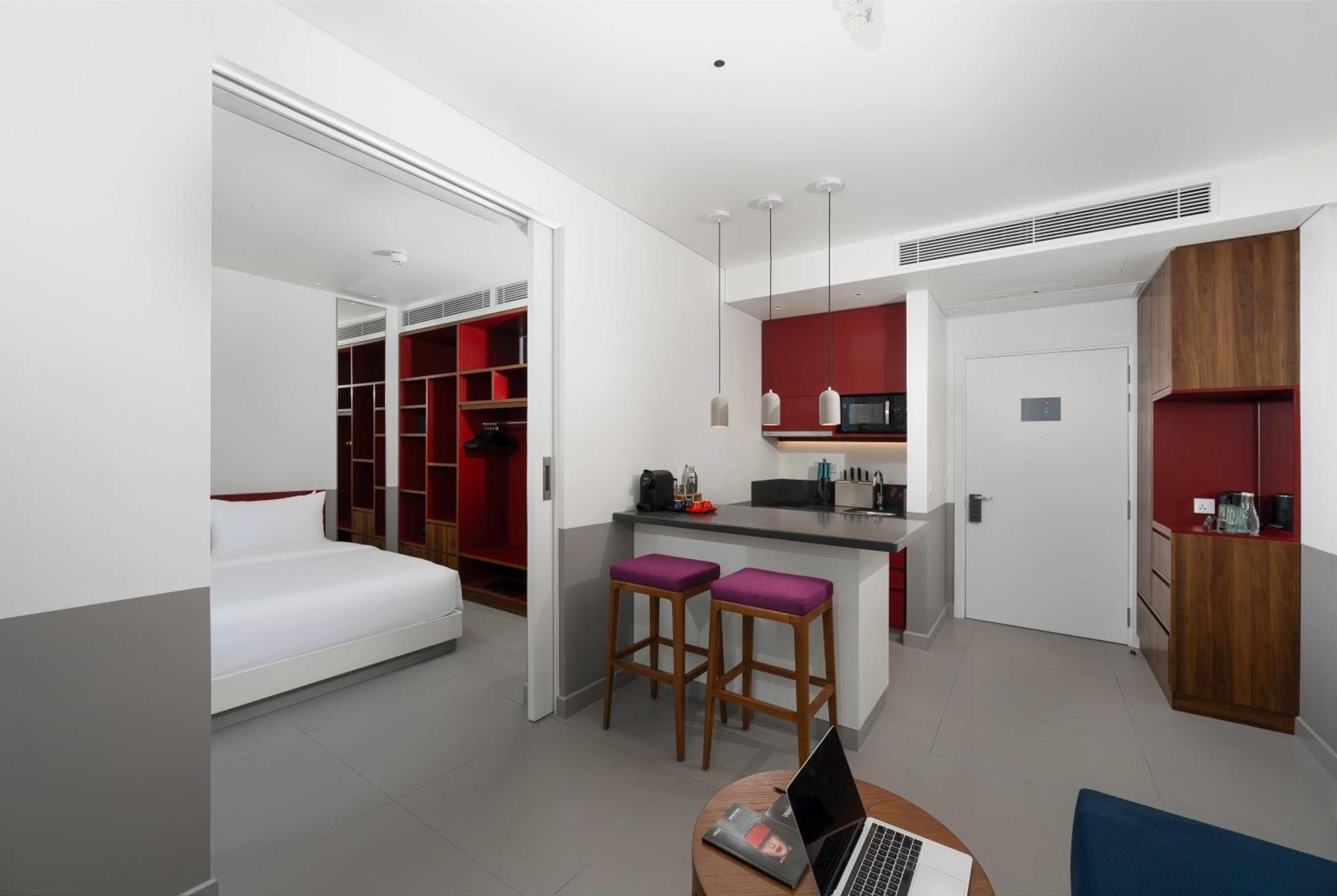 Wink Icon Hotel Danang Riverside - Luxury Suites - 24Hrs Stay & Rooftop Pool Bar Buitenkant foto