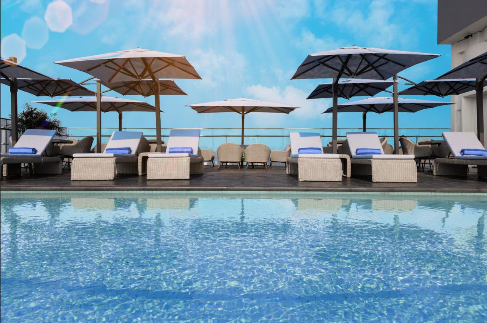 Wink Icon Hotel Danang Riverside - Luxury Suites - 24Hrs Stay & Rooftop Pool Bar Buitenkant foto